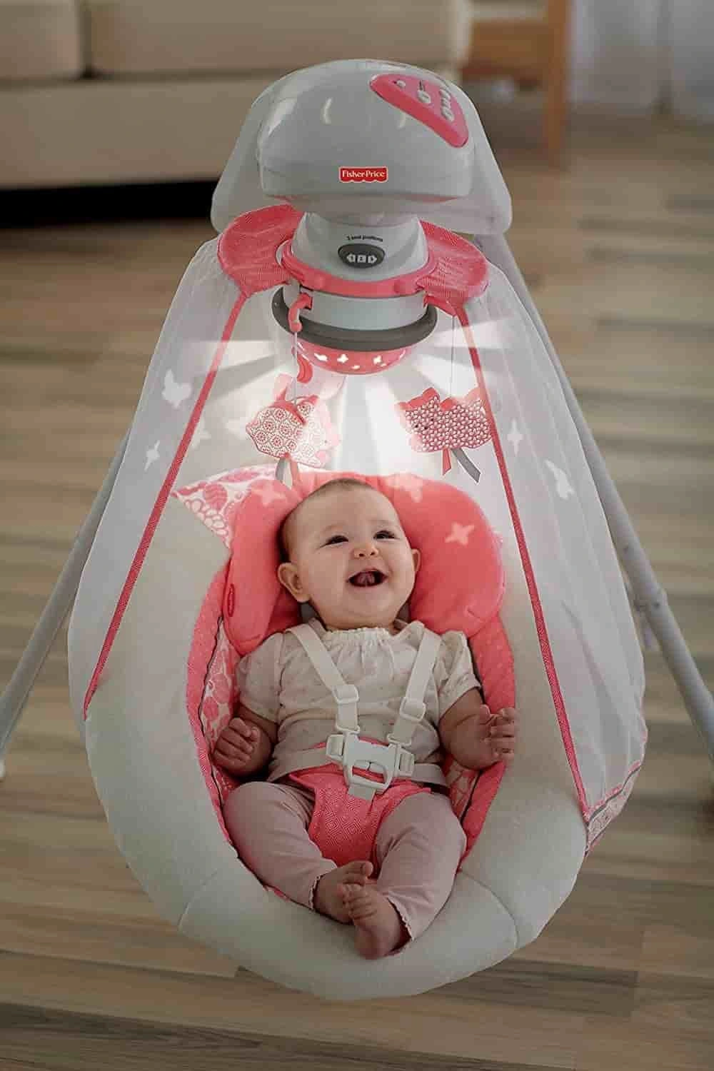 Leagănul electric Flori de coral (Coral Floral) Fisher Price Starlight Cradle Swing